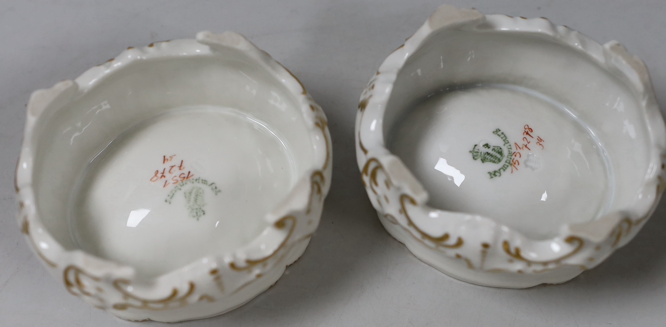 Two Nymphenburg salts pots and covers, 9cm tall